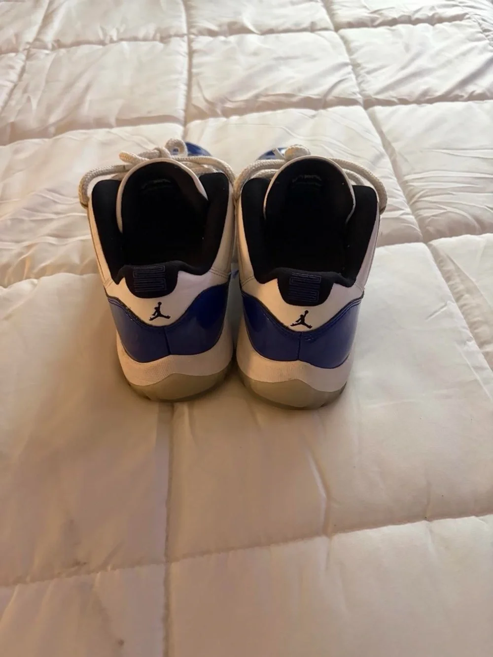 Jordan Men's Retro Low Top Sneakers in Blue, White, and Black